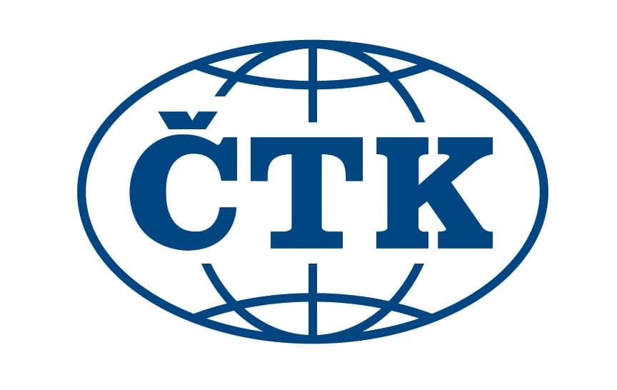 Logo ČTK — modrý nápis v oválu se symbolem zeměkoule