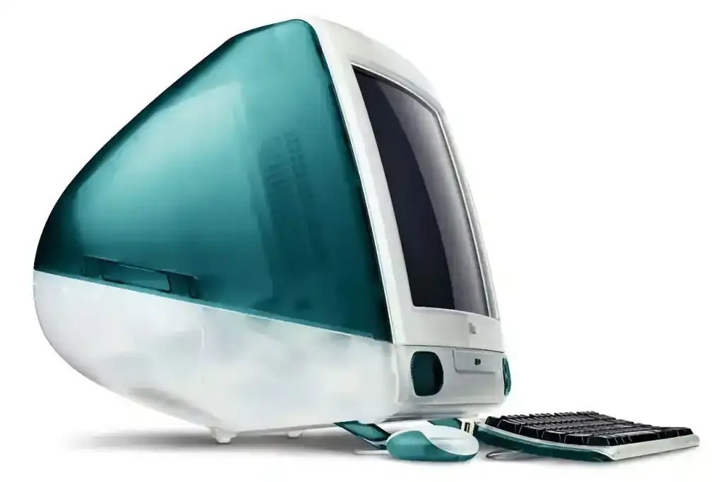 Počítač iMac Průsvitný modrozelený počítač iMac s bílou spodní částí, klávesnicí a myší